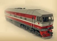 Масштабная модель 1:87 Советский локомотив ТЭП70, красный, серый, с журналом №11, перевыпуск 2026 года (Наши Поезда. Modimio)