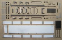 Сборная модель 1:43 Трехосный бортовой полуприцеп Нефтекамский-93341-24-07 с кониками и усиленной передней стенкой (Клен)